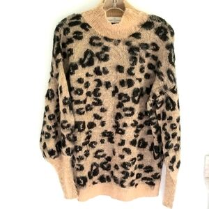 Leopard turtleneck sweater by Wild Fern
